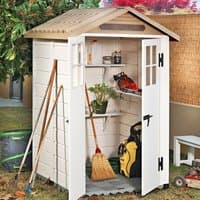 Beige plastic garden storage shed with a brown roof, open double doors, and interior shelves holding tools and equipment.