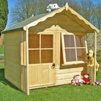 Wooden garden playhouse with pitched roof, front door, two windows, and decorative trim, surrounded by plush toys.