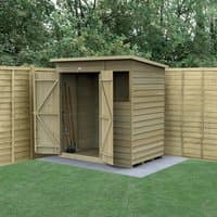 Wooden shed with double doors, overlap panels, and a small window, set on a concrete base in a fenced garden.