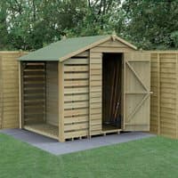 Wooden shed with apex roof, pressure-treated overlap panels, windowless design, attached logstore, green roof.