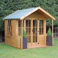 Wooden summer house with glass doors, side windows, and a green roof, flanked by two potted plants.