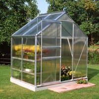 Aluminium frame polycarbonate greenhouse with clear panels and peaked roof, 6'x4' size, set on grass.
