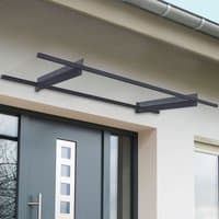 Grey Palram Canopia door canopy with sleek, modern design and clear panel, mounted above a contemporary door.
