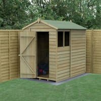 Wooden apex shed with overlap panels, single door, and window; pressure-treated for durability, set in a grassy yard.