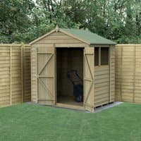 Wooden shed with double doors, apex roof, and pressure-treated overlap panels, set in a garden with fencing.