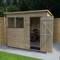 Wooden pent shed with shiplap cladding, single door, window, and pressure-treated wood, 7' x 5' size.