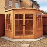 Wooden 7 x 7 Shire Hampton Garden Summerhouse with double doors and large windows, set on a gravel base.