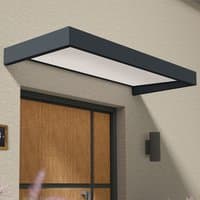 Grey and white door canopy with sleek rectangular design, mounted above a wooden door.