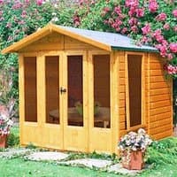 Shire Parham Wooden Garden Summerhouse, natural wood finish, large windows, pitched roof, surrounded by flowers.
