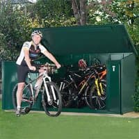 Green metal bike shed by Asgard, fits 4 bikes, with hinged lid and lockable door, measuring 7'5 x 3'4.
