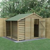 Wooden apex shed with logstore, overlap panels, pressure treated, green roof, open door, surrounded by fencing.