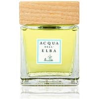 Square glass bottle with light wood cap, containing yellow liquid, labeled "Acqua dell'Elba - Brezza di Mare Diffuser."