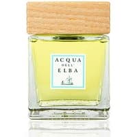 Square glass bottle with yellow liquid, wooden cap, and Acqua dell'Elba label for marine diffuser.