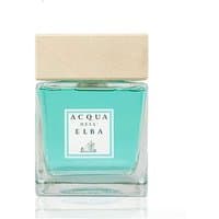 Clear glass Acqua dell'Elba diffuser with turquoise liquid and beige square cap, labeled "Isola d'Elba."