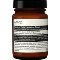 Aesop Mandarin Facial Hydrating Cream in amber jar with black lid and white label, 120 ml.