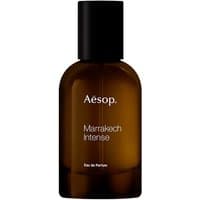 Brown glass bottle of Aesop Marrakech Intense Eau de Parfum with black cap and white text.