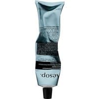 Aesop Reverence Aromatique Hand Balm in a crumpled blue tube with black text and a black screw cap, 75 ml size.