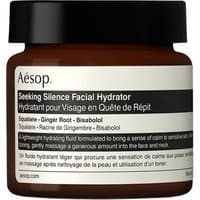 Brown jar with black lid, Aesop label, "Seeking Silence Facial Hydrator" text, 60 ml, for sensitive skin.