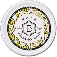 Benamor Nata Lip Balm 12 ml in a round white tin with black and yellow floral design and bold "B" logo.