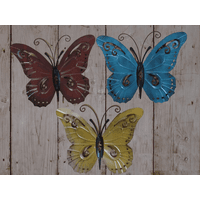 Colorful metal butterfly wall art set with red, blue, and yellow butterflies featuring intricate cut-out designs.