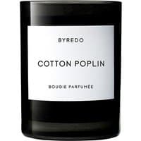 Black Byredo Cotton Poplin Chypre Candle with white label and black text in a sleek glass container.