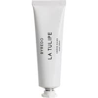 White Byredo La Tulipe hand cream tube, black text, silver cap, 30 ml size.
