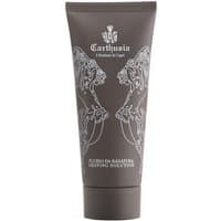 Brown Carthusia shaving fluid tube with white floral design, 100 ml, labeled for all skin types.