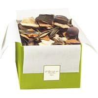 Green box of Christian Tortu Vert Frais potpourri with citrus slices and botanicals, white label on front.