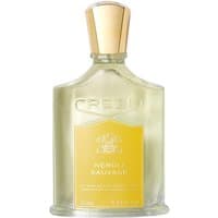 Clear glass bottle of Creed Neroli Sauvage Eau de Parfum, gold cap, yellow label with crest, 50 ml men's citrus perfume.
