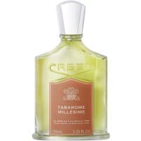 Clear glass bottle of Creed Tabarome Eau de Parfum with silver cap and brown label, 100 ml men's leather fragrance.