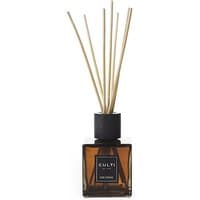 Brown glass bottle Culti floral diffuser with black label and natural reed sticks.