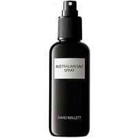 Black spray bottle labeled "Australian Salt Spray" by David Mallett, 150 ml, with a sleek design and pump nozzle.