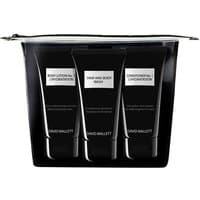 David Mallett Travel Kit with three black 50 ml tubes in a clear zippered pouch, labeled for hair and body care.