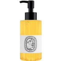 Diptyque Do Son Shower Oil, 200 ml, in a clear ribbed bottle with black pump and white label featuring a decorative logo.