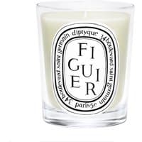 Diptyque Figuier candle in clear glass with black and white oval label, 190g, fruity scent.