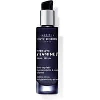 Dark blue Esthederm Intensive Vitamine E Serum bottle with black pump, silver cap, and white text detailing.