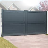 Grey Exeter Premium Metal Double Gates with sleek panels and sturdy frame, set on a concrete driveway.