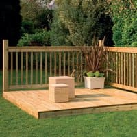 Wooden deck kit with handrails, 2.4m square, natural finish, set on grass, includes two wicker stools and a planter.