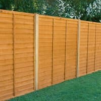 Forest 6' x 5' straight cut overlap fence panel, wooden slats, natural finish, vertical support beams, garden setting.