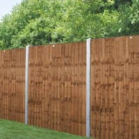 Brown pressure-treated vertical closeboard fence panel, 6' x 5'6, with wooden slats and metal posts, by Forest Garden.