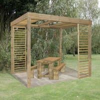 Wooden garden pergola kit with slatted panels, natural finish, 10'x8', over a picnic table on grass.