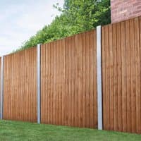 Forest Vertical 6x6 Closeboard Fence Panel, brown wood with vertical slats, supported by metal posts.