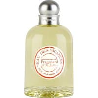 Clear glass bottle of Fragonard Eau des Vacances perfume with silver cap and citrus label, 200 ml.