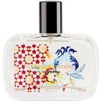 Clear glass bottle of Fragonard Grenade Pivoine perfume, floral and geometric design, black cap, 50 ml.