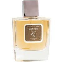 Clear glass bottle with amber liquid, square brown cap, and label reading "Cashmere" by Franck Boclet, 100 ml unisex perfume.