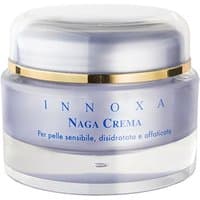 Clear jar of Innoxa Naga Crema, 50 ml, with gold trim and blue label for sensitive skin.