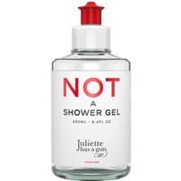 Clear bottle of Juliette has a Gun cleansing body gel, bold red cap, red and black text on white label.