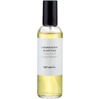 Clear bottle of Laboratorio Olfattivo Agrumeto Citrus Room Spray, black cap, white label with black text, 100 ml.