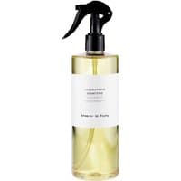 Clear bottle of Laboratorio Olfattivo Arancio in Fiore room spray with black trigger nozzle and white label.