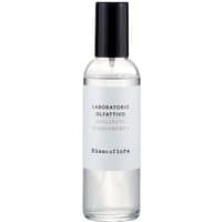 Clear bottle of Biancofiore floral room spray with black cap and white label by Laboratorio Olfattivo, 100 ml.